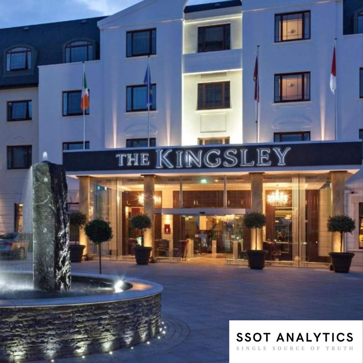 The Kingsley Hotel entrance at dusk, with the SSOT Analytics logo